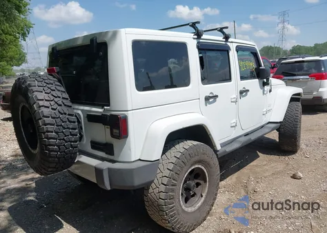 2011 Jeep Wrangler Unlimited Sahara z USA, uszkodzony, nr VIN 1J4HA5H16BL563723